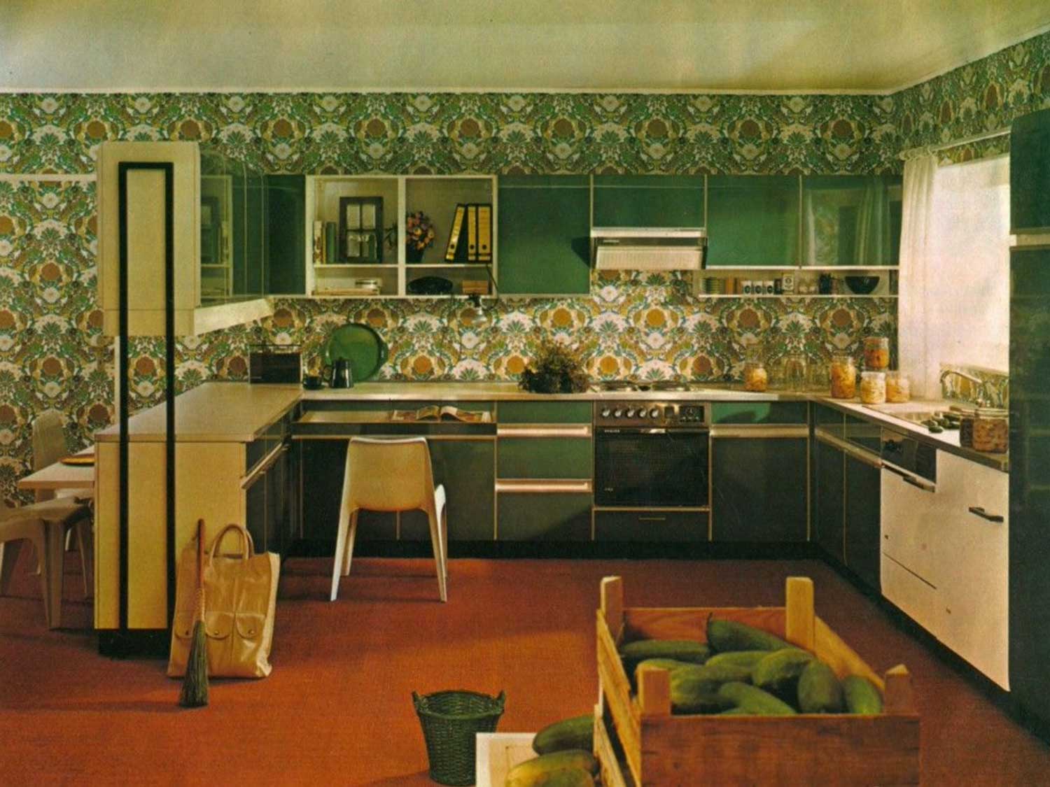 A-classic-1970s-avocado-green-kitchen-with-bold-paterned-wall-paper