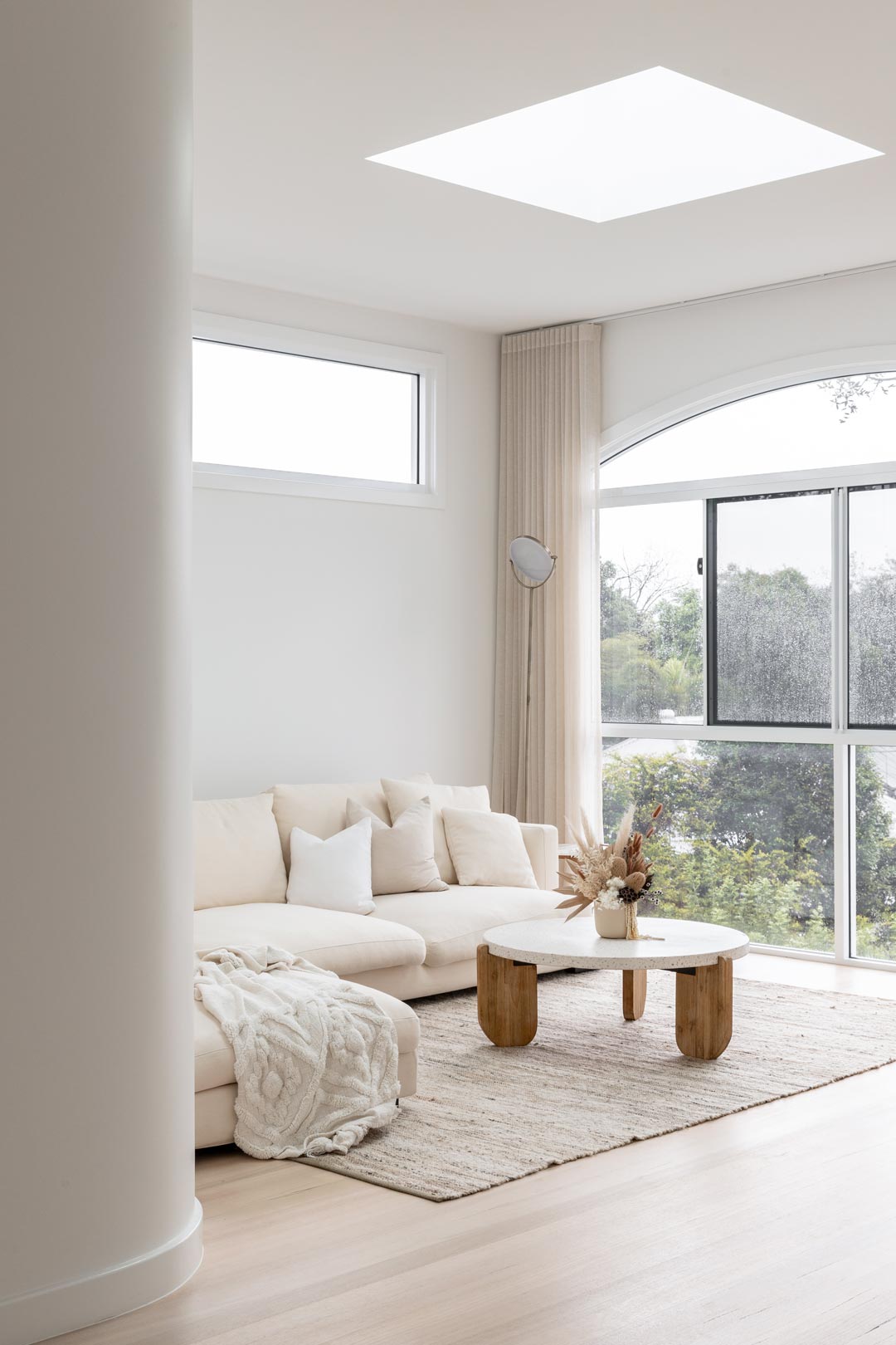 A-soft-neutral-living-room-in-a-renovated-queenslander-style-home