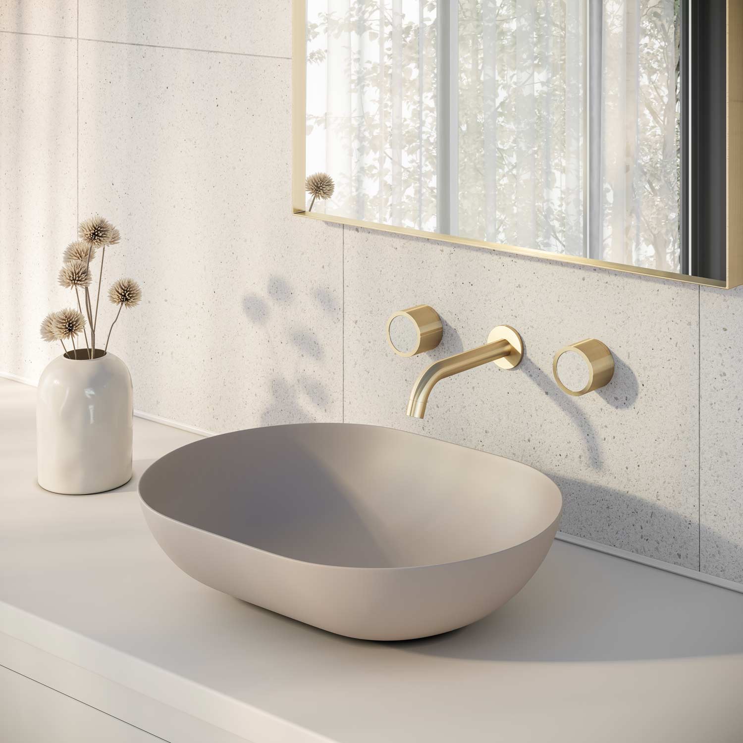 Cohesive-design-bathroom-with-matching-stone-tiles-and-tapware