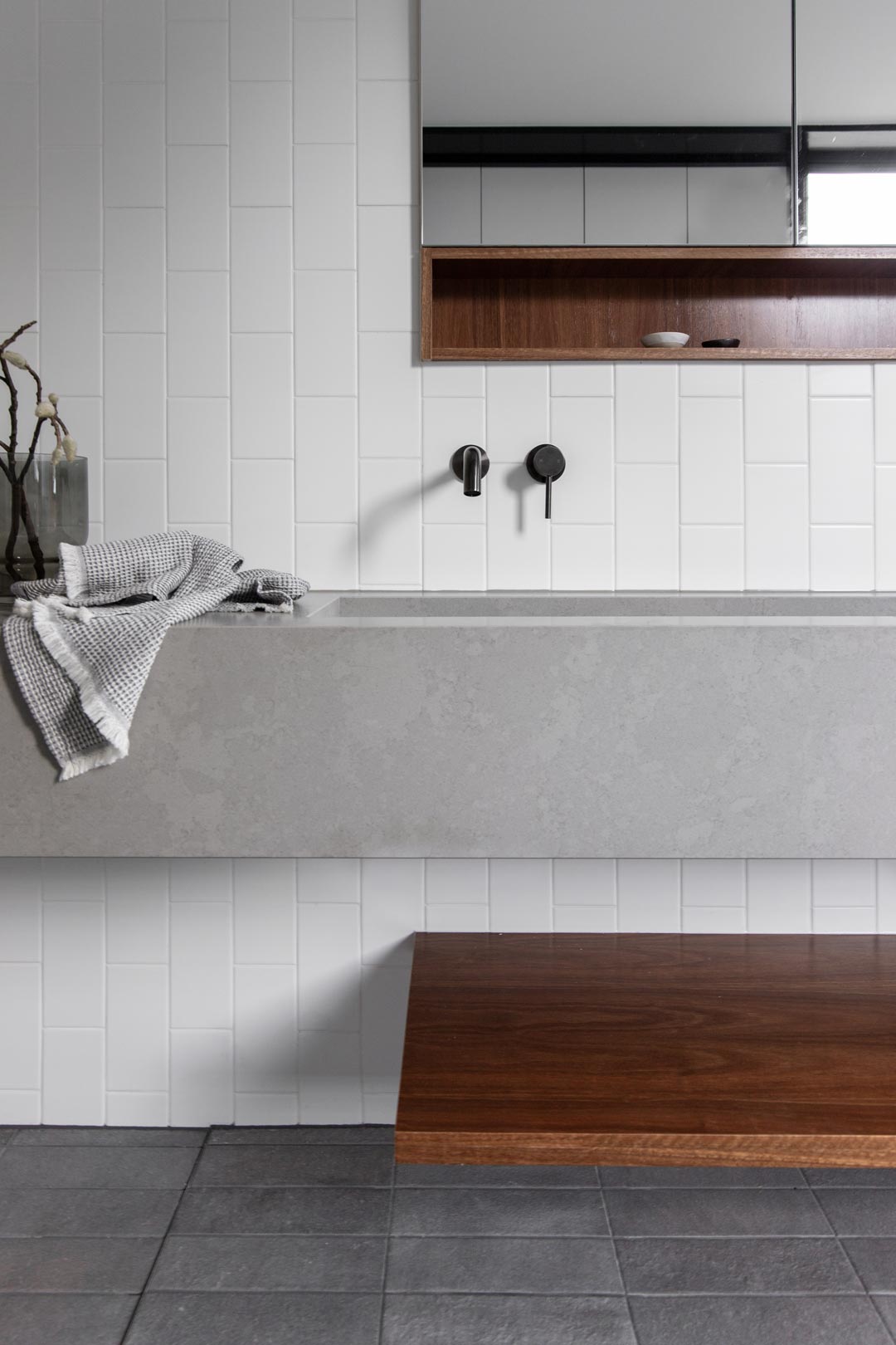 Concrete-bathroom-design-ideas-a-floating-concrete-basin-vanity-with-timber-de