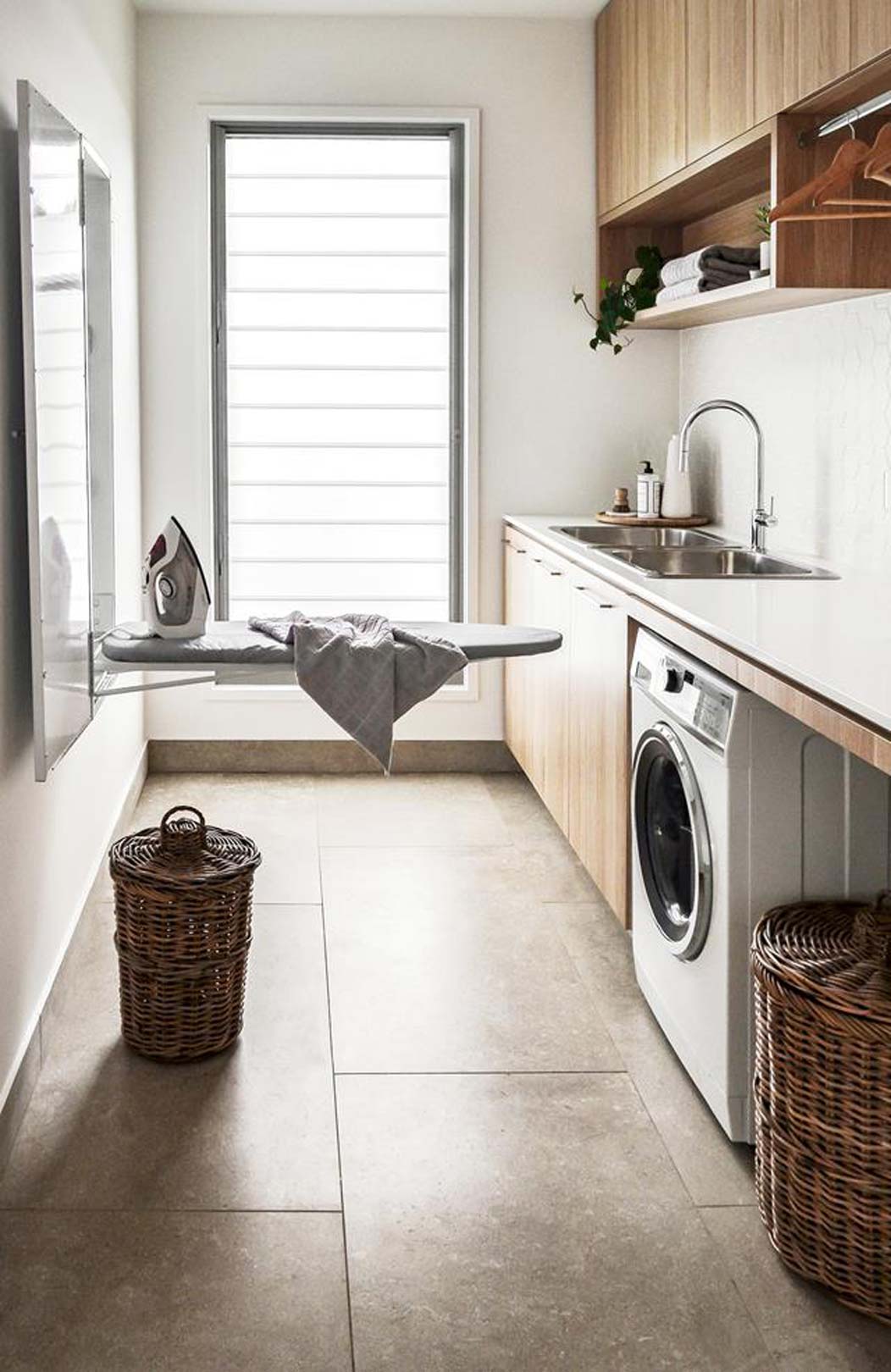 DIY-small-laundry-room-ideas-include-keeping-your-laundry-tidy-and-a-fold-out-hidden-ironing-board