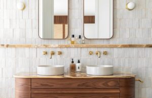 Earthy-bathroom-design-with-zellige-subway-tiles-and-brushed-brass-tapware