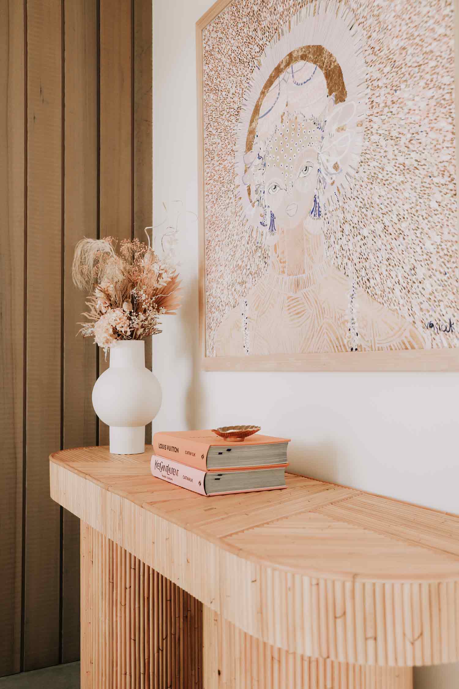 Pink-and-peach-art-for-living-room-walls-in-a-warm-textured-entryway