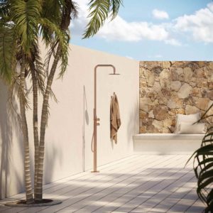 mediterranean outdoor shower with a natural stone wall