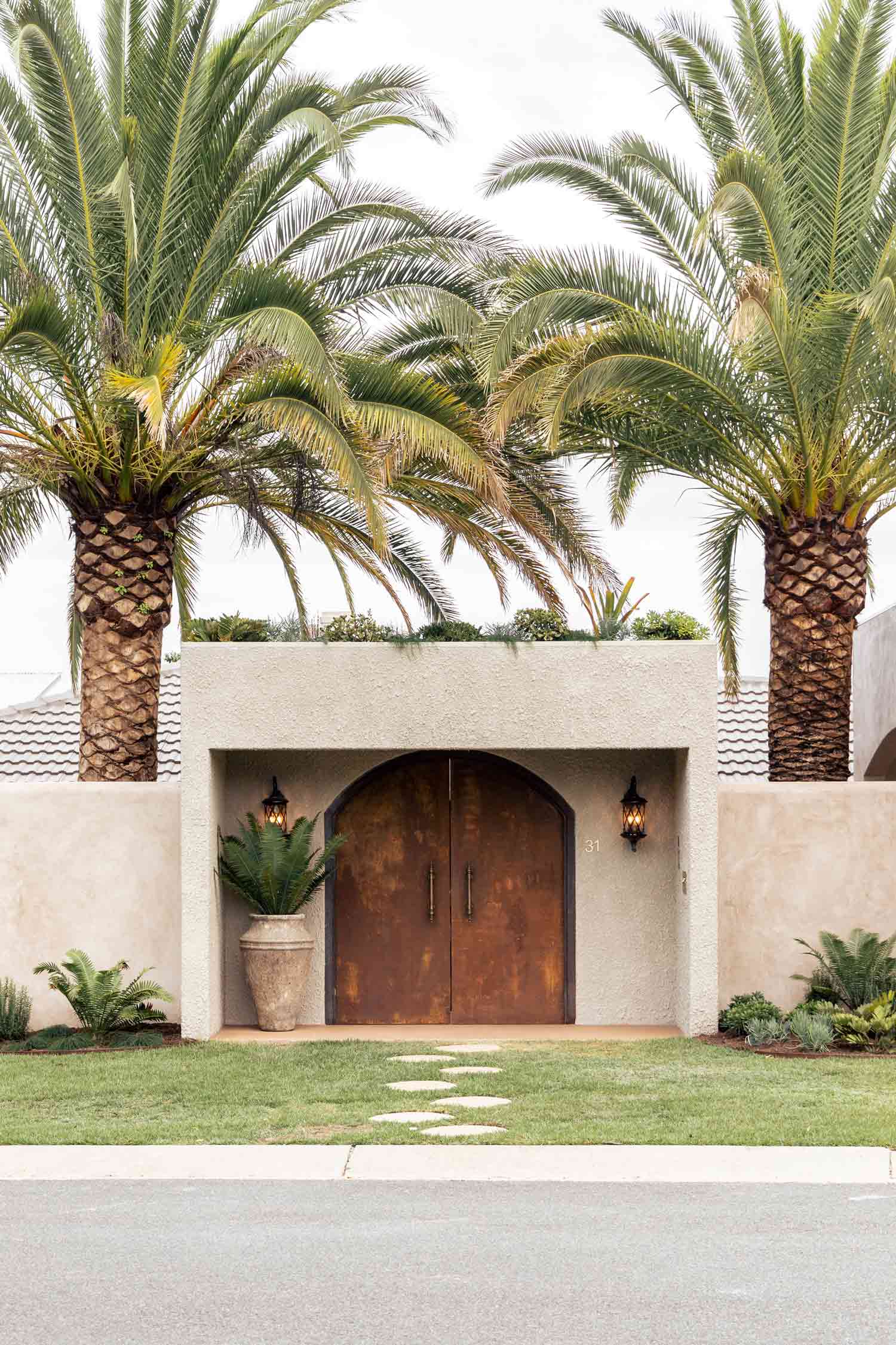 rustic modern mediterranean house with palm trees